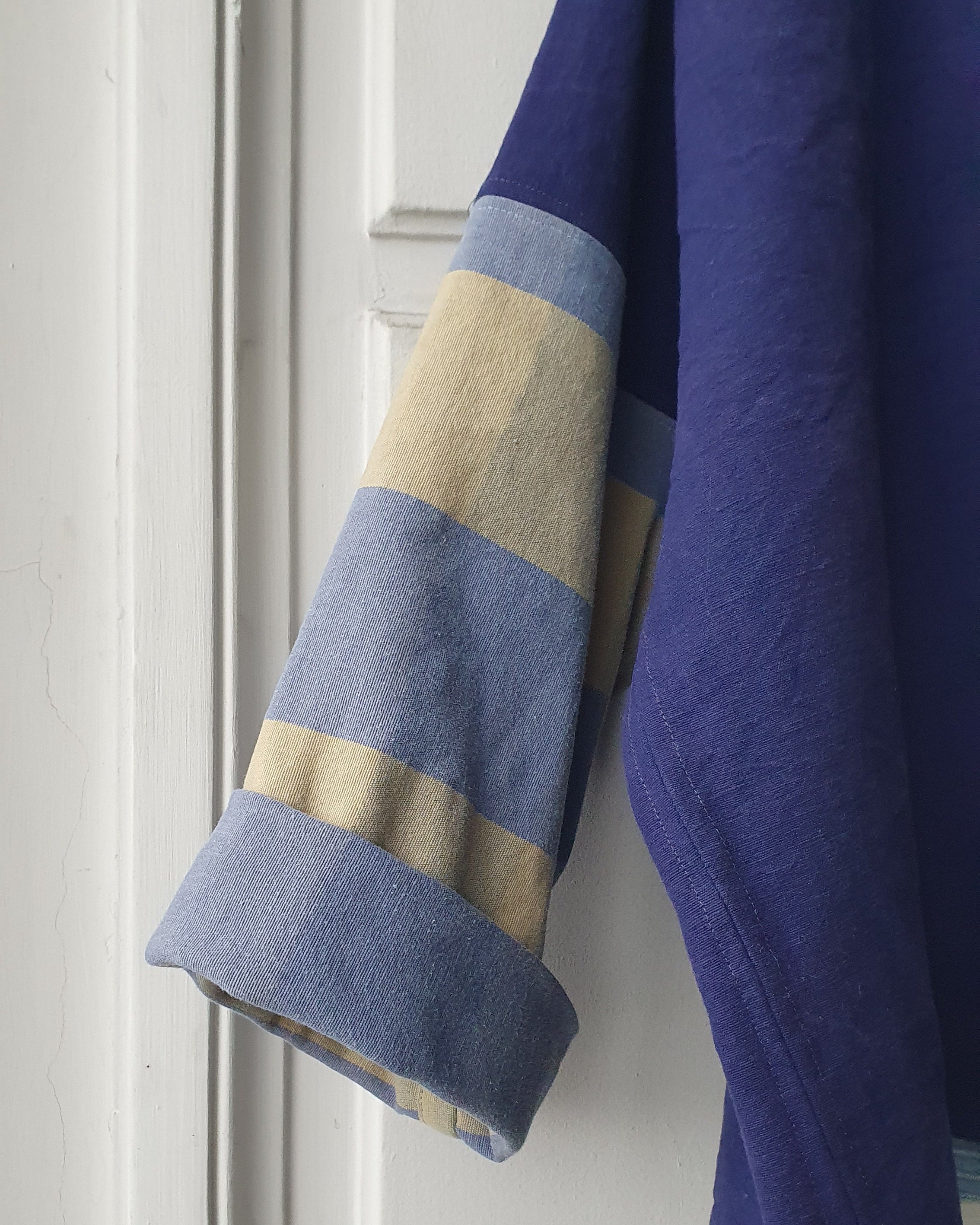 Unique handcrafted patchwork Haori Kimono jacket in cotton, in colors blue and green checks. details of the sleeve. Made by Atelier Heimat, handcrafted by Kachiri Faes